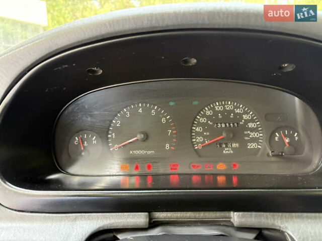 Бежевий Кіа Кларус, об'ємом двигуна 2 л та пробігом 239 тис. км за 2550 $, фото 35 на Automoto.ua