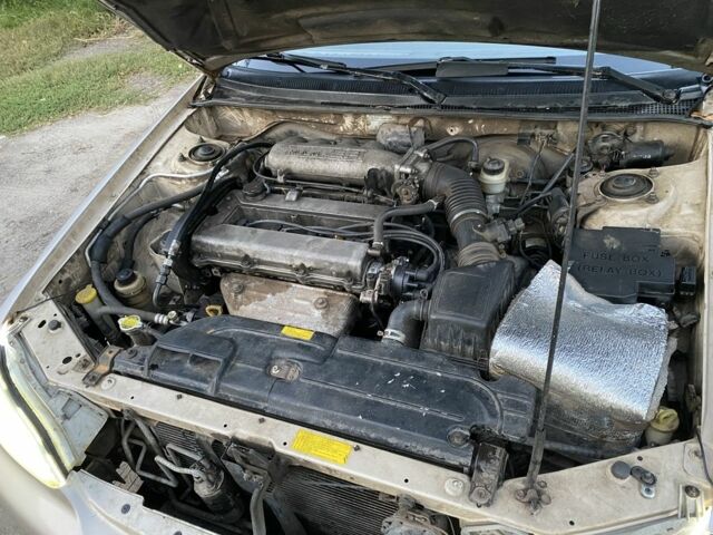 Бежевий Кіа Кларус, об'ємом двигуна 2 л та пробігом 327 тис. км за 2000 $, фото 4 на Automoto.ua