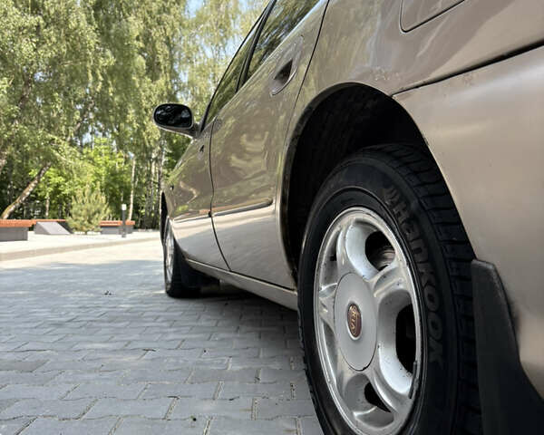 Бежевий Кіа Кларус, об'ємом двигуна 2 л та пробігом 239 тис. км за 2550 $, фото 8 на Automoto.ua