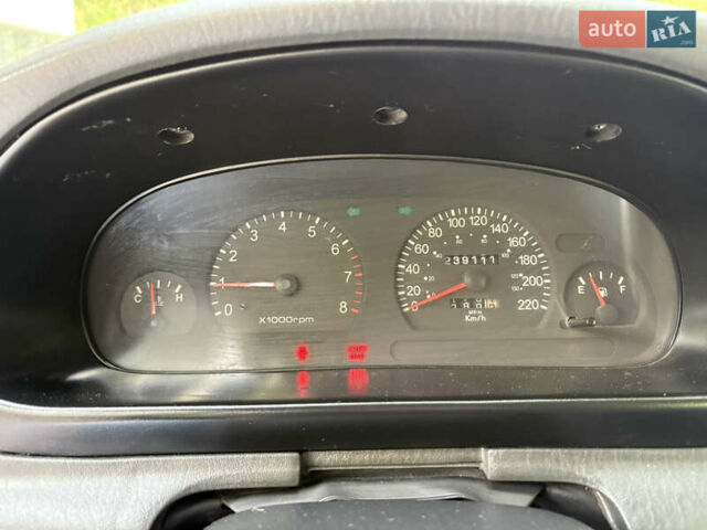 Бежевий Кіа Кларус, об'ємом двигуна 2 л та пробігом 239 тис. км за 2550 $, фото 36 на Automoto.ua