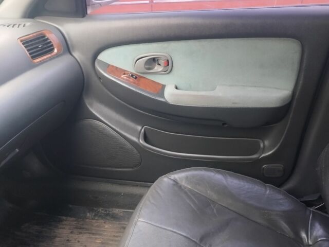 Бежевый Киа Кларус, объемом двигателя 0 л и пробегом 328 тыс. км за 1000 $, фото 2 на Automoto.ua