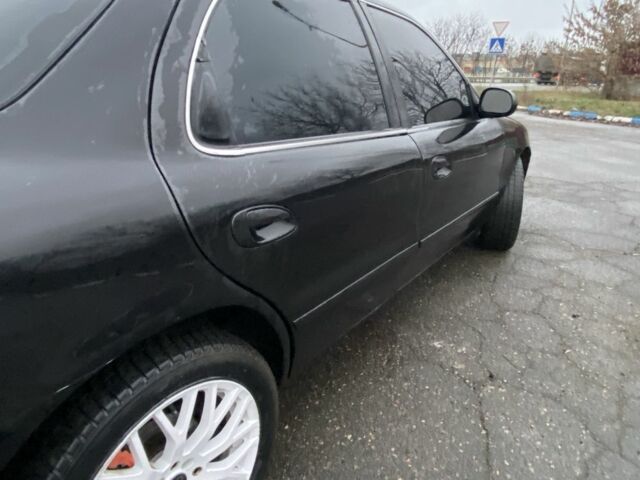 Чорний Кіа Кларус, об'ємом двигуна 2 л та пробігом 300 тис. км за 1600 $, фото 5 на Automoto.ua