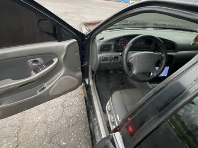 Чорний Кіа Кларус, об'ємом двигуна 2 л та пробігом 300 тис. км за 1600 $, фото 7 на Automoto.ua