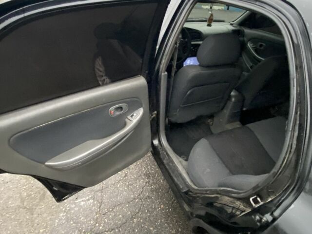 Чорний Кіа Кларус, об'ємом двигуна 2 л та пробігом 300 тис. км за 1600 $, фото 8 на Automoto.ua