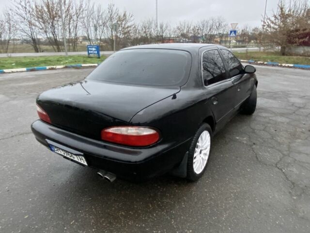 Чорний Кіа Кларус, об'ємом двигуна 2 л та пробігом 300 тис. км за 1600 $, фото 3 на Automoto.ua