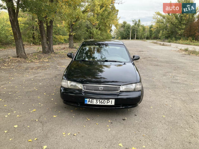 Чорний Кіа Кларус, об'ємом двигуна 2 л та пробігом 493 тис. км за 1850 $, фото 6 на Automoto.ua