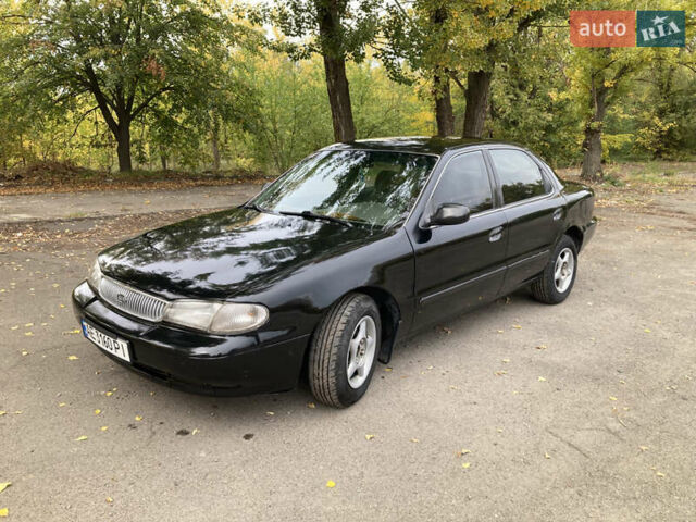Чорний Кіа Кларус, об'ємом двигуна 2 л та пробігом 493 тис. км за 1850 $, фото 1 на Automoto.ua