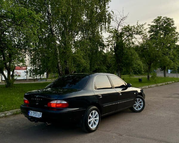 Черный Киа Кларус, объемом двигателя 1.8 л и пробегом 235 тыс. км за 2500 $, фото 5 на Automoto.ua