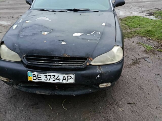 Черный Киа Кларус, объемом двигателя 1.8 л и пробегом 200 тыс. км за 650 $, фото 1 на Automoto.ua