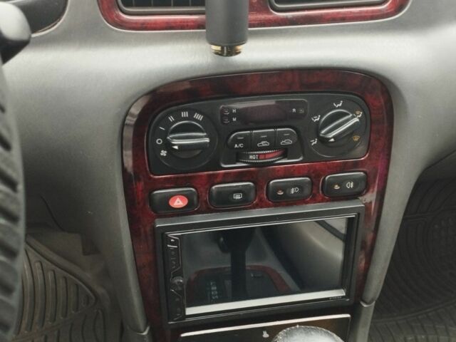 Коричневый Киа Кларус, объемом двигателя 2 л и пробегом 232 тыс. км за 1700 $, фото 5 на Automoto.ua