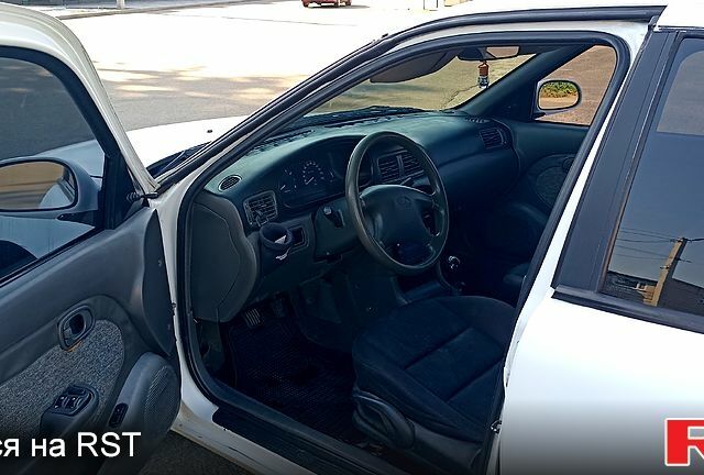 Киа Кларус, объемом двигателя 2 л и пробегом 397 тыс. км за 1200 $, фото 5 на Automoto.ua