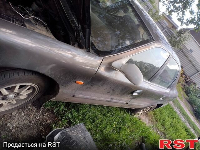 Киа Кларус, объемом двигателя 2 л и пробегом 123 тыс. км за 500 $, фото 7 на Automoto.ua