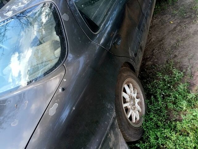 Киа Кларус, объемом двигателя 2 л и пробегом 123 тыс. км за 500 $, фото 8 на Automoto.ua