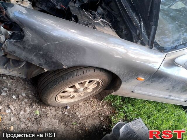 Киа Кларус, объемом двигателя 2 л и пробегом 123 тыс. км за 500 $, фото 6 на Automoto.ua