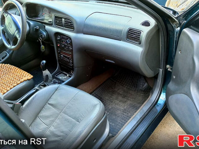 Кіа Кларус, об'ємом двигуна 2 л та пробігом 310 тис. км за 2400 $, фото 6 на Automoto.ua