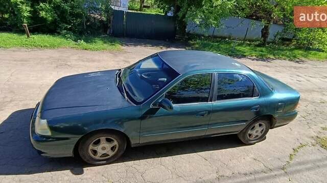 Киа Кларус, объемом двигателя 2 л и пробегом 332 тыс. км за 1000 $, фото 8 на Automoto.ua