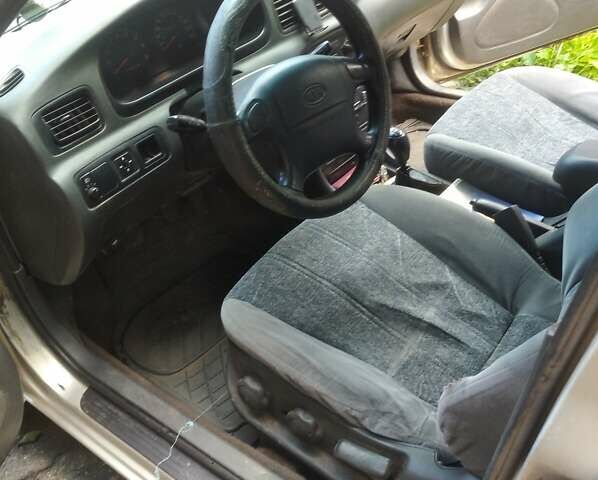 Киа Кларус, объемом двигателя 2 л и пробегом 262 тыс. км за 1700 $, фото 4 на Automoto.ua