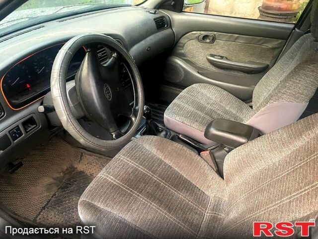 Серый Киа Кларус, объемом двигателя 2 л и пробегом 333 тыс. км за 1700 $, фото 5 на Automoto.ua