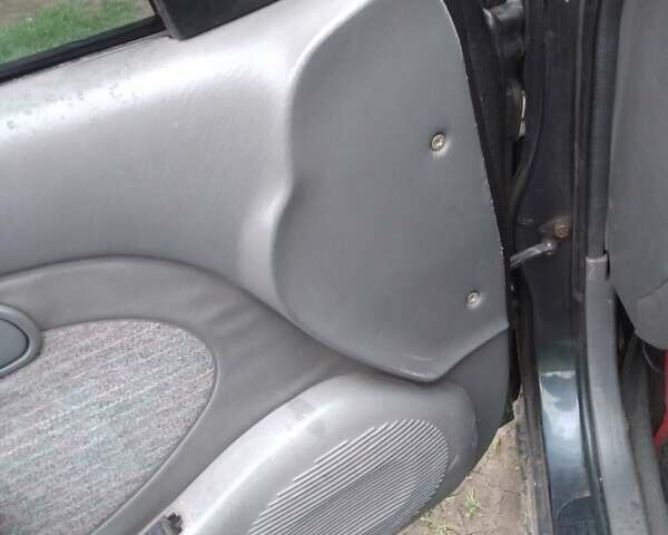 Сірий Кіа Кларус, об'ємом двигуна 2 л та пробігом 480 тис. км за 1300 $, фото 8 на Automoto.ua