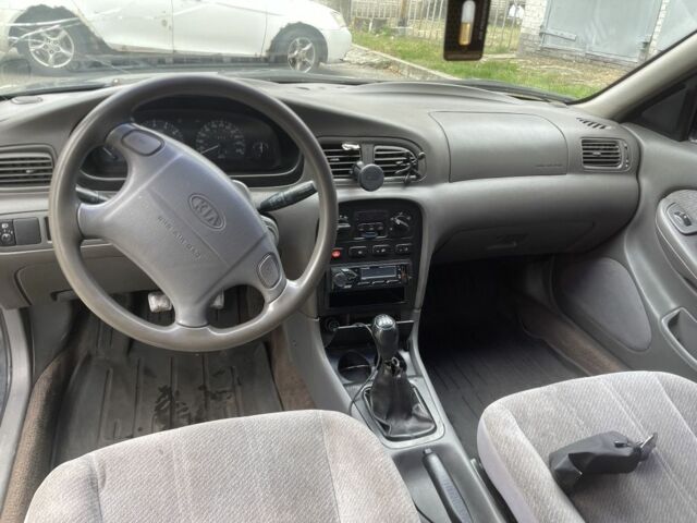 Сірий Кіа Кларус, об'ємом двигуна 2 л та пробігом 350 тис. км за 951 $, фото 2 на Automoto.ua