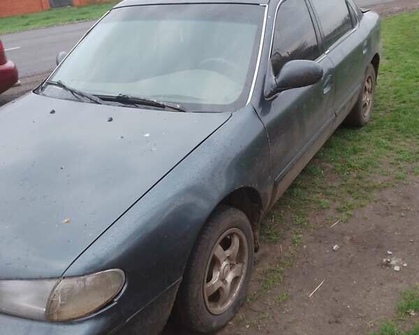 Сірий Кіа Кларус, об'ємом двигуна 2 л та пробігом 480 тис. км за 1300 $, фото 4 на Automoto.ua