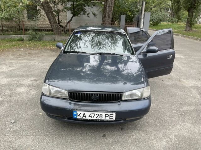 Сірий Кіа Кларус, об'ємом двигуна 2 л та пробігом 350 тис. км за 951 $, фото 1 на Automoto.ua