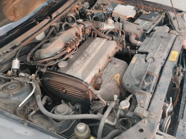 Серый Киа Кларус, объемом двигателя 2 л и пробегом 250 тыс. км за 1600 $, фото 5 на Automoto.ua