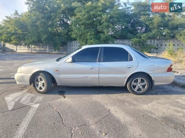 Серый Киа Кларус, объемом двигателя 2 л и пробегом 352 тыс. км за 2000 $, фото 9 на Automoto.ua