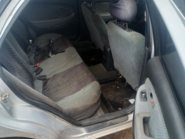 Сірий Кіа Кларус, об'ємом двигуна 1.8 л та пробігом 500 тис. км за 947 $, фото 5 на Automoto.ua