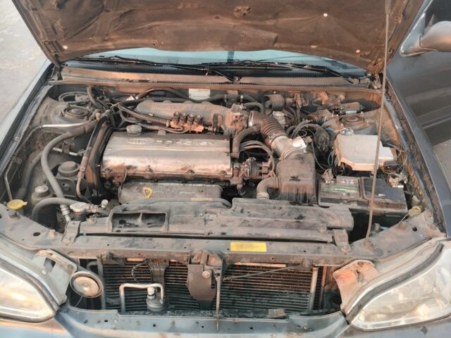 Серый Киа Кларус, объемом двигателя 2 л и пробегом 250 тыс. км за 1600 $, фото 4 на Automoto.ua