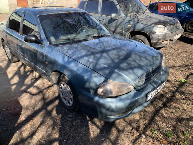 Серый Киа Кларус, объемом двигателя 2 л и пробегом 280 тыс. км за 1350 $, фото 4 на Automoto.ua