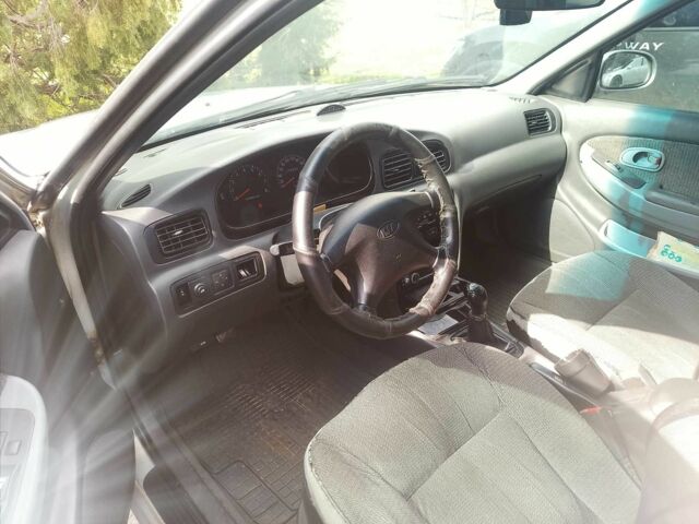 Сірий Кіа Кларус, об'ємом двигуна 2 л та пробігом 380 тис. км за 1600 $, фото 1 на Automoto.ua