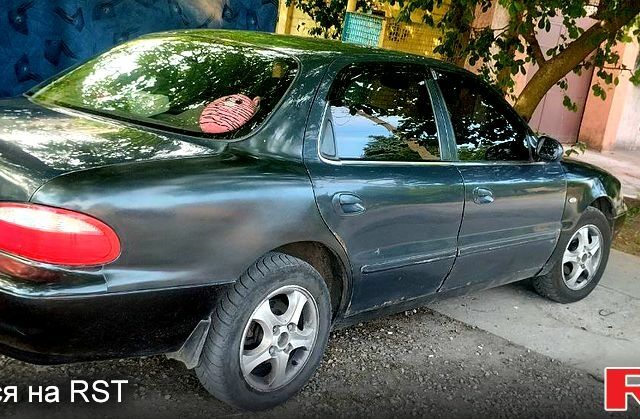 Кіа Кларус 1998 у Запоріжжя на Automoto.ua Сірий Кіа Кларус, об'ємом двигуна 2 л та пробігом 100 тис. км за 2300 $, фото 2 на Automoto.ua