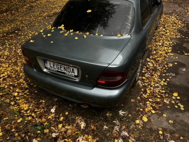 Серый Киа Кларус, объемом двигателя 2 л и пробегом 360 тыс. км за 1191 $, фото 2 на Automoto.ua