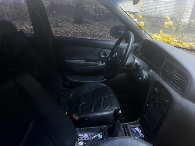 Серый Киа Кларус, объемом двигателя 2 л и пробегом 360 тыс. км за 1191 $, фото 7 на Automoto.ua