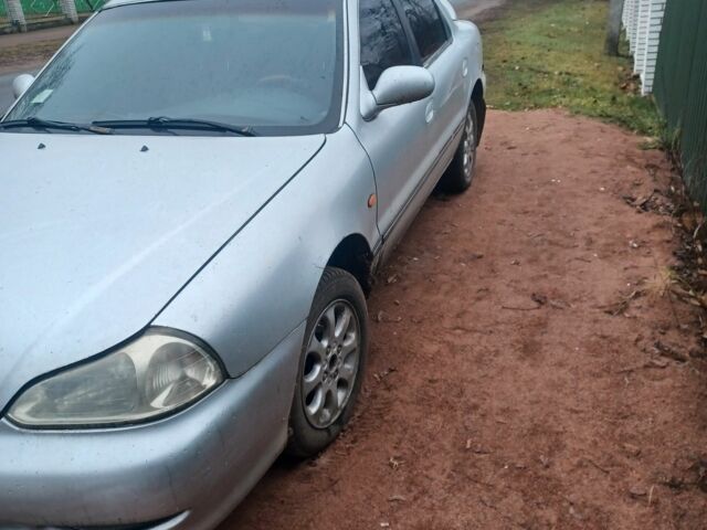 Сірий Кіа Кларус, об'ємом двигуна 1.8 л та пробігом 500 тис. км за 947 $, фото 2 на Automoto.ua