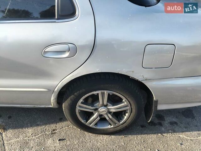 Серый Киа Кларус, объемом двигателя 2 л и пробегом 352 тыс. км за 2000 $, фото 3 на Automoto.ua