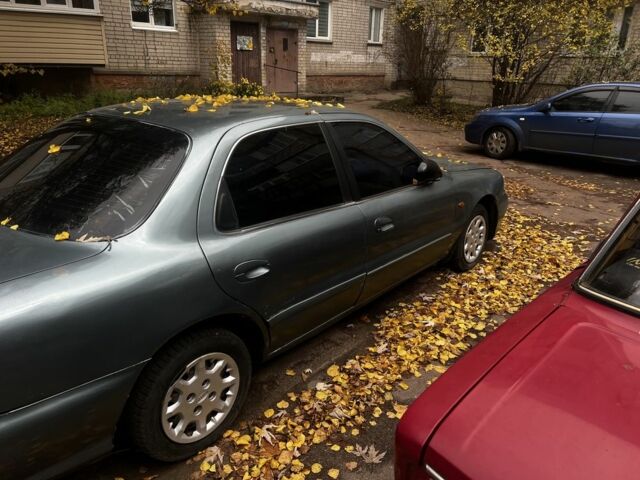 Серый Киа Кларус, объемом двигателя 2 л и пробегом 360 тыс. км за 1191 $, фото 3 на Automoto.ua