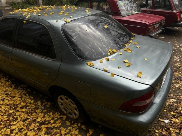 Серый Киа Кларус, объемом двигателя 2 л и пробегом 360 тыс. км за 1191 $, фото 4 на Automoto.ua