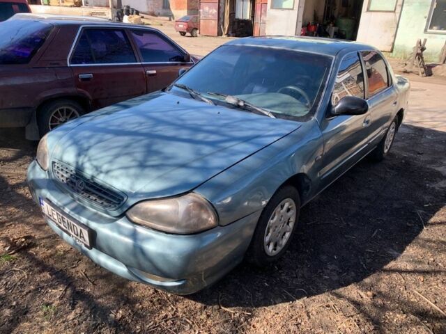 Серый Киа Кларус, объемом двигателя 2 л и пробегом 360 тыс. км за 1191 $, фото 4 на Automoto.ua