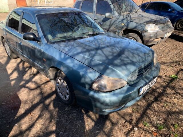 Серый Киа Кларус, объемом двигателя 2 л и пробегом 360 тыс. км за 1191 $, фото 5 на Automoto.ua