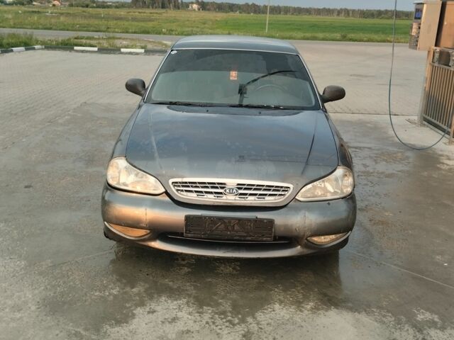 Серый Киа Кларус, объемом двигателя 2 л и пробегом 250 тыс. км за 1600 $, фото 2 на Automoto.ua