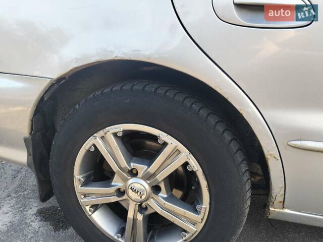 Сірий Кіа Кларус, об'ємом двигуна 2 л та пробігом 352 тис. км за 2000 $, фото 1 на Automoto.ua