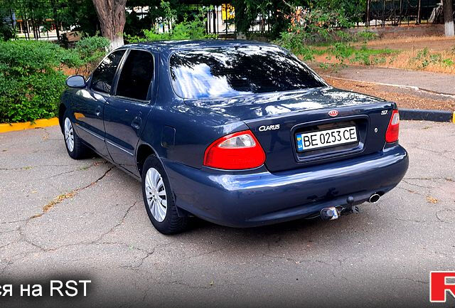 Серый Киа Кларус, объемом двигателя 2 л и пробегом 295 тыс. км за 3000 $, фото 5 на Automoto.ua