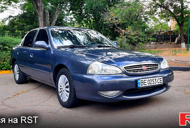Серый Киа Кларус, объемом двигателя 2 л и пробегом 295 тыс. км за 3000 $, фото 1 на Automoto.ua