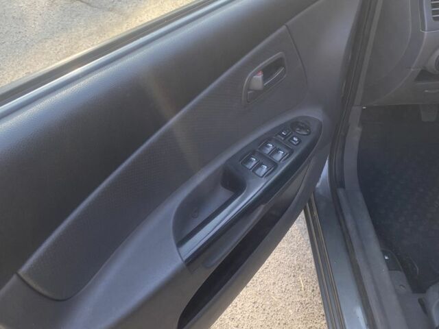 Серый Киа Кларус, объемом двигателя 1.4 л и пробегом 179 тыс. км за 4000 $, фото 10 на Automoto.ua