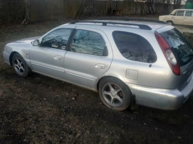 Серый Киа Кларус, объемом двигателя 1.8 л и пробегом 250 тыс. км за 1298 $, фото 2 на Automoto.ua