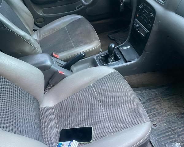 Синій Кіа Кларус, об'ємом двигуна 2 л та пробігом 360 тис. км за 1300 $, фото 4 на Automoto.ua