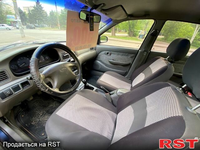 Синий Киа Кларус, объемом двигателя 2 л и пробегом 252 тыс. км за 1999 $, фото 3 на Automoto.ua