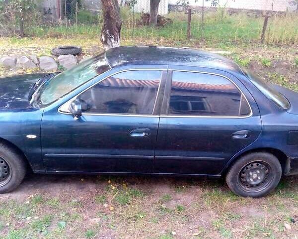 Киа Кларус 1997 в Светловдске на Automoto.ua Синий Киа Кларус, объемом двигателя 2 л и пробегом 200 тыс. км за 1200 $, фото 4 на Automoto.ua